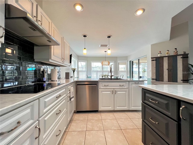 kitchen featuring light tile patterned floors, black electric stovetop, under cabinet range hood, a sink, and stainless steel dishwasher