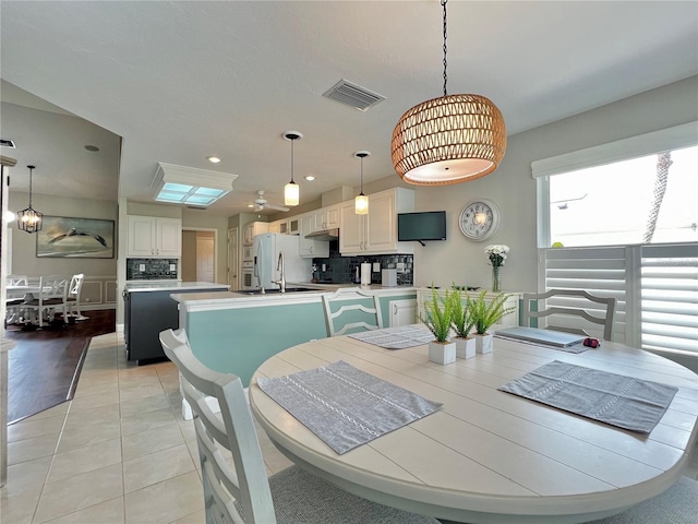 dining area with recessed lighting, visible vents, and light tile patterned floors