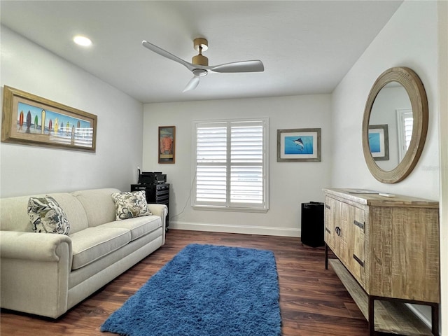 living area featuring ceiling fan, baseboards, dark wood-style flooring, and recessed lighting