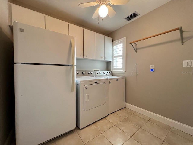 clothes washing area featuring cabinet space, visible vents, washing machine and dryer, light tile patterned flooring, and ceiling fan