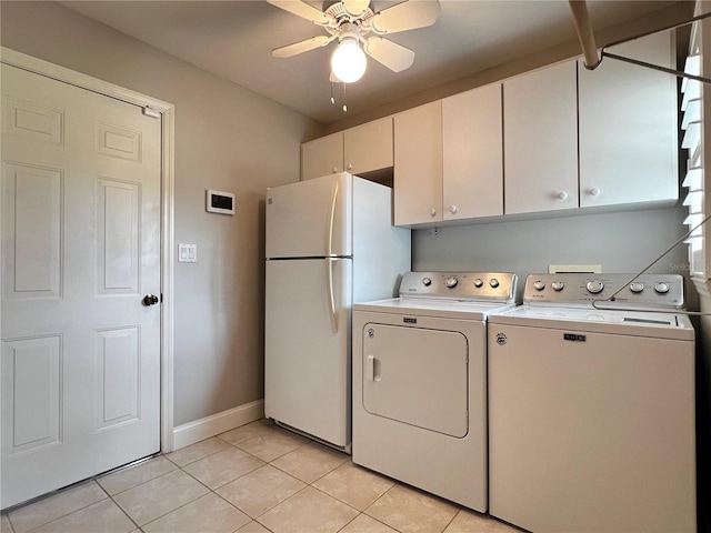 laundry room featuring light tile patterned floors, cabinet space, baseboards, a ceiling fan, and independent washer and dryer