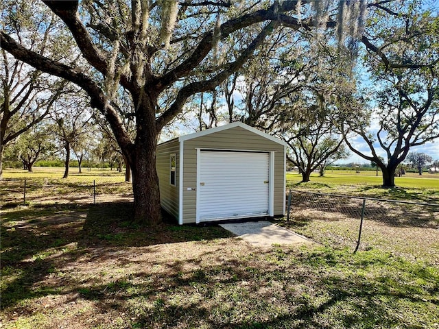 detached garage with fence