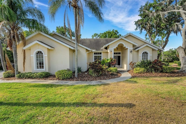 6928 Hayter Ln, Lakeland, FL 33813 - single story home with stucco siding and a front lawn