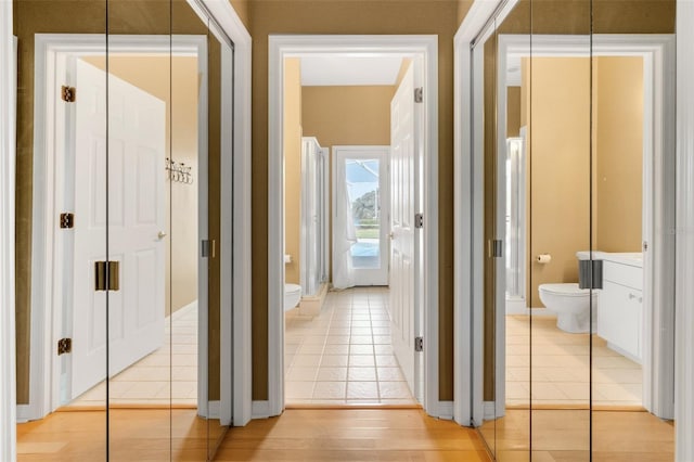 6928 Hayter Ln, Lakeland, FL 33813 - hallway featuring light tile patterned floors