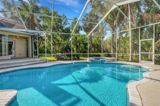 6928 Hayter Ln, Lakeland, FL 33813 - view of swimming pool with a pool with connected hot tub, a lanai, and a patio