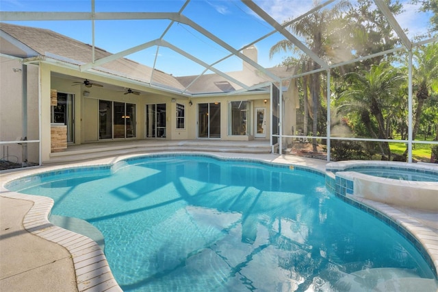 6928 Hayter Ln, Lakeland, FL 33813 - view of swimming pool with a lanai, a ceiling fan, a pool with connected hot tub, and a patio