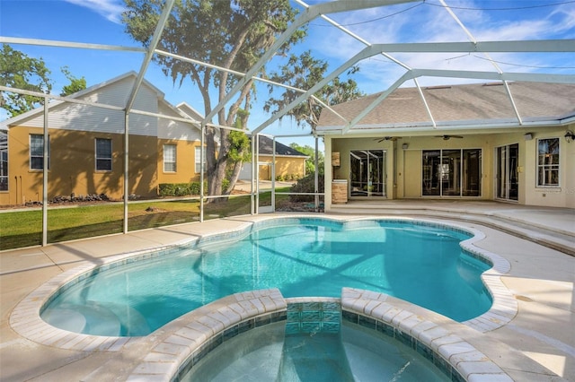 6928 Hayter Ln, Lakeland, FL 33813 - view of pool with ceiling fan, glass enclosure, a patio area, and a pool with connected hot tub