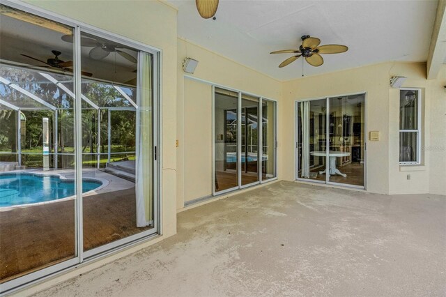 6928 Hayter Ln, Lakeland, FL 33813 - unfurnished sunroom with a ceiling fan