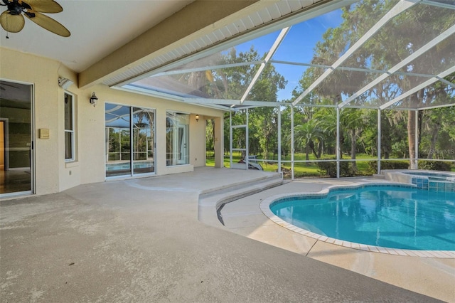 6928 Hayter Ln, Lakeland, FL 33813 - view of swimming pool featuring ceiling fan, a lanai, a pool with connected hot tub, and a patio