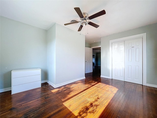 105 Old Connersville Rd, Bartow, FL 33830 - unfurnished bedroom featuring hardwood / wood-style flooring, baseboards, a ceiling fan, and a closet