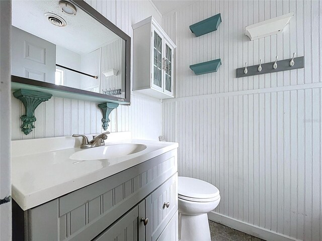 105 Old Connersville Rd, Bartow, FL 33830 - bathroom featuring toilet, vanity, and tile patterned flooring