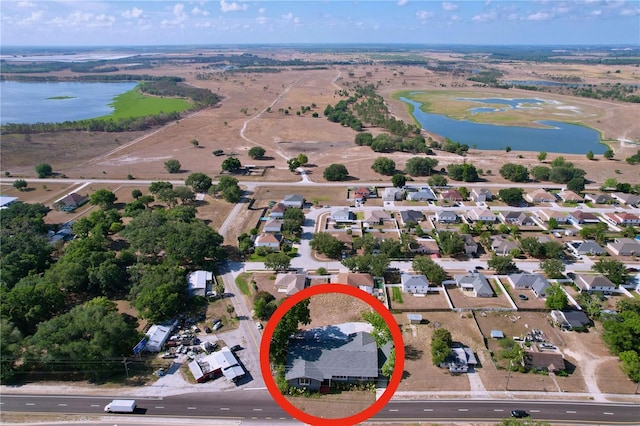 105 Old Connersville Rd, Bartow, FL 33830 - aerial overview of property's location with a nearby body of water and nearby suburban area