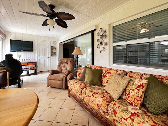 3804 Perugia Ave, Sebring, FL 33872 - living room with light tile patterned floors, ceiling fan, and plenty of natural light