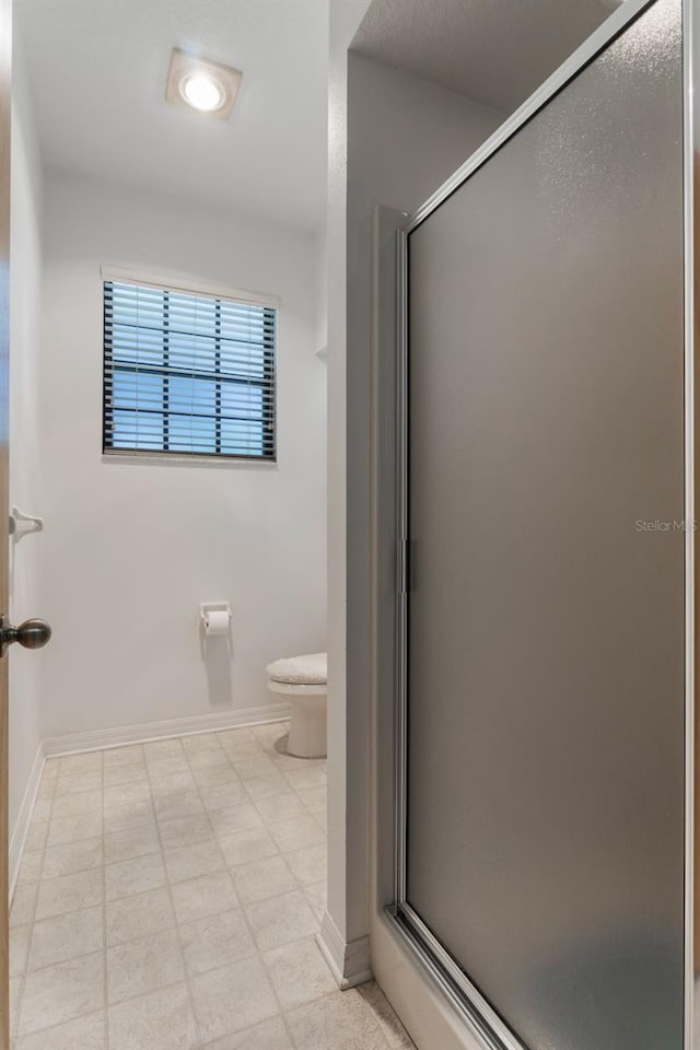 1131 Country Oaks Blvd, Lake Wales, FL 33898 - bathroom with a shower stall, toilet, and baseboards