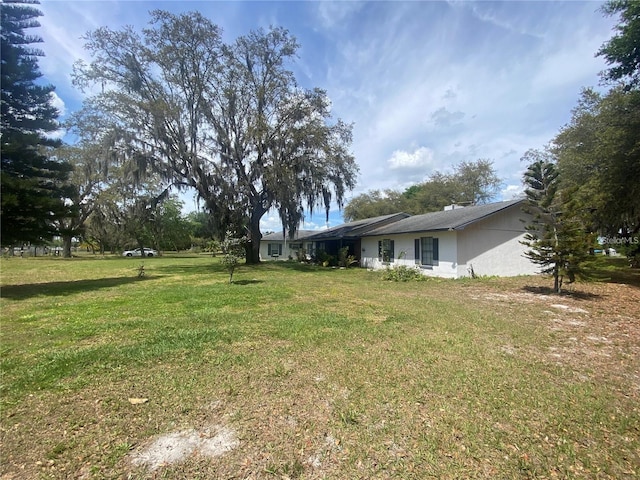 4151 Boggy Creek Rd, Kissimmee, FL 34744 - view of green lawn