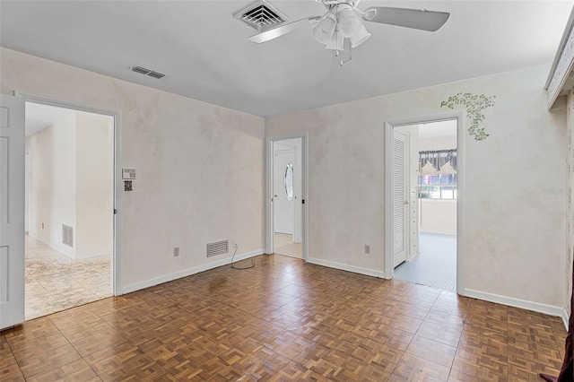 900 Howard Ter NW, Winter Haven, FL 33881 - empty room featuring ceiling fan and baseboards