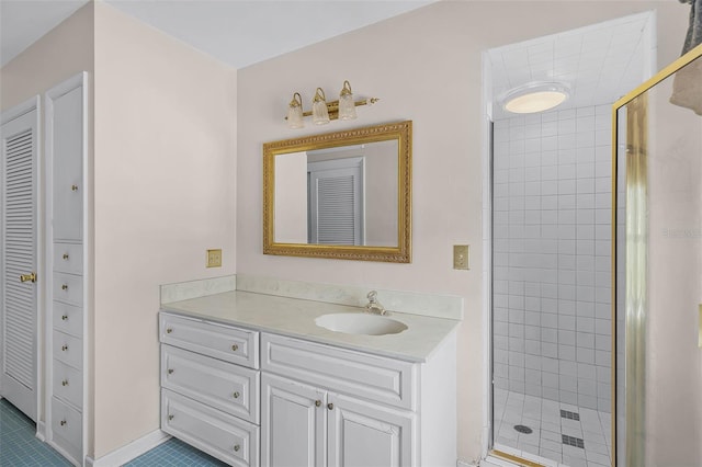 900 Howard Ter NW, Winter Haven, FL 33881 - full bathroom featuring a stall shower, vanity, a closet, and tile patterned floors