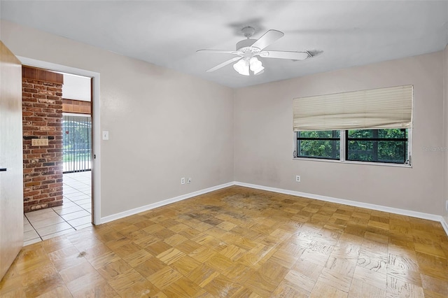 900 Howard Ter NW, Winter Haven, FL 33881 - spare room with baseboards and a ceiling fan