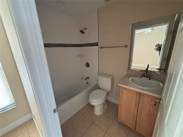 340 W Stanford St, Bartow, FL 33830 - full bathroom featuring vanity, toilet, tile patterned flooring, shower / washtub combination, and baseboards