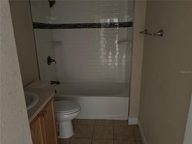 340 W Stanford St, Bartow, FL 33830 - bathroom with tile patterned floors, toilet, vanity, and shower / washtub combination