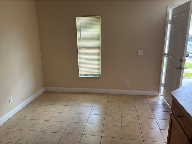 340 W Stanford St, Bartow, FL 33830 - unfurnished room with baseboards and light tile patterned flooring