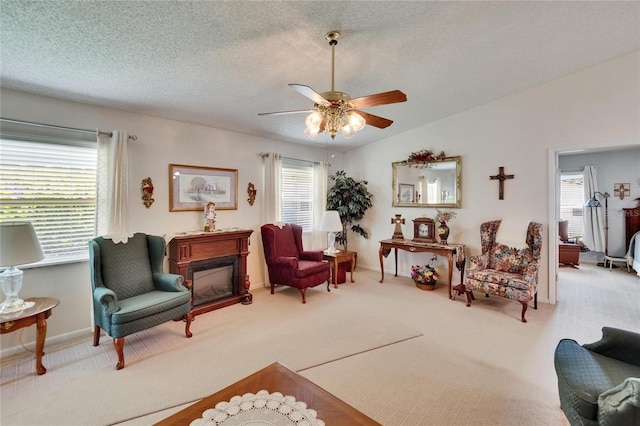 3154 Prairie Dunes Cir W, Lakeland, FL 33810 - sitting room with a ceiling fan, carpet flooring, plenty of natural light, and a textured ceiling