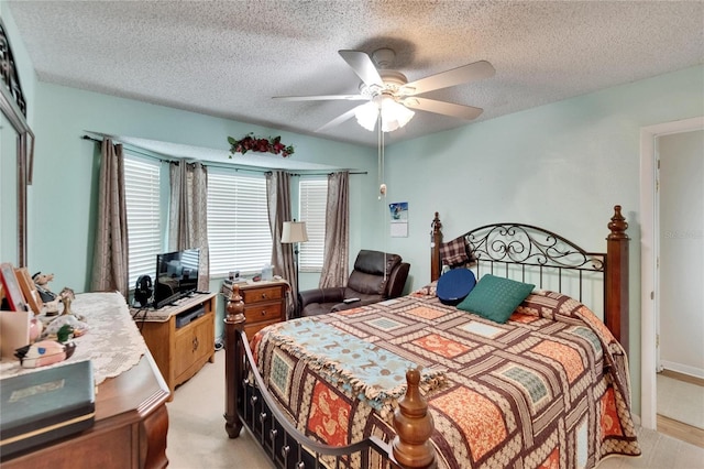 3154 Prairie Dunes Cir W, Lakeland, FL 33810 - bedroom with a textured ceiling and ceiling fan
