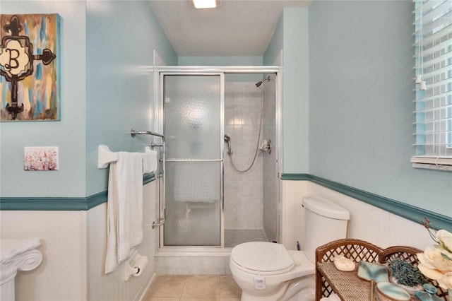 3154 Prairie Dunes Cir W, Lakeland, FL 33810 - bathroom with a stall shower and tile patterned floors