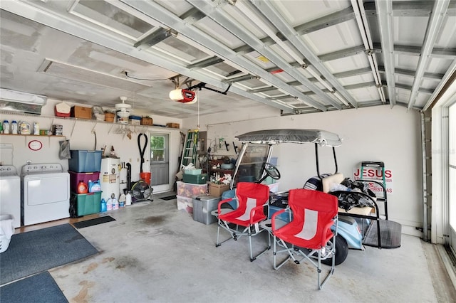3154 Prairie Dunes Cir W, Lakeland, FL 33810 - garage featuring separate washer and dryer, water heater, and a garage door opener