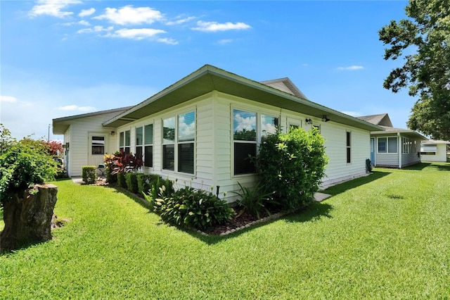 3154 Prairie Dunes Cir W, Lakeland, FL 33810 - view of home's exterior featuring a yard