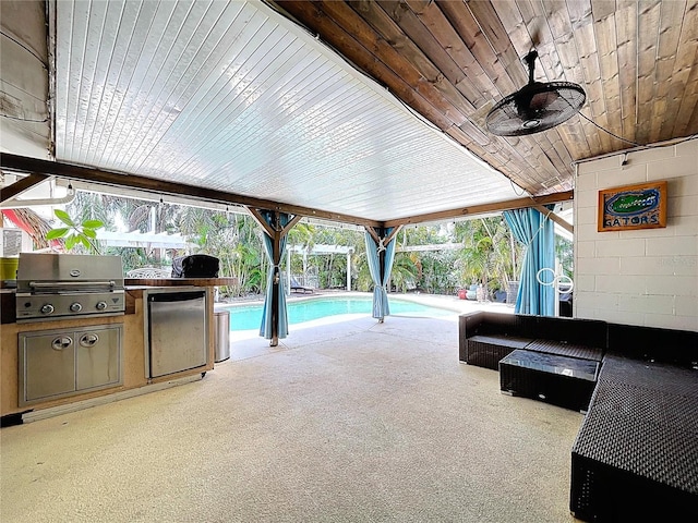 4966 Foxrun Ln, Lakeland, FL 33813 - view of patio / terrace featuring an outdoor pool, exterior kitchen, and ceiling fan