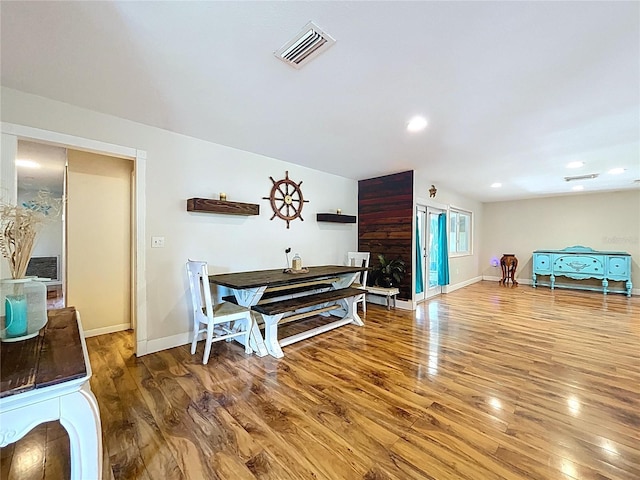 4966 Foxrun Ln, Lakeland, FL 33813 - dining room with wood finished floors and recessed lighting