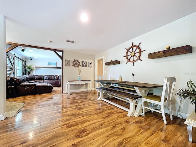 4966 Foxrun Ln, Lakeland, FL 33813 - dining room with light wood-type flooring and baseboards