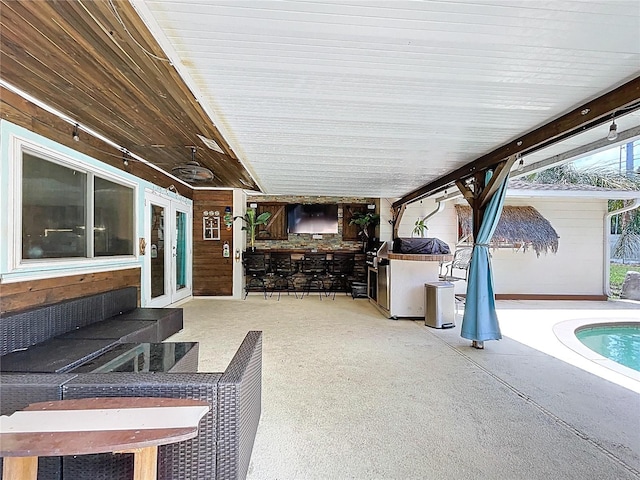4966 Foxrun Ln, Lakeland, FL 33813 - view of patio / terrace featuring an outdoor pool