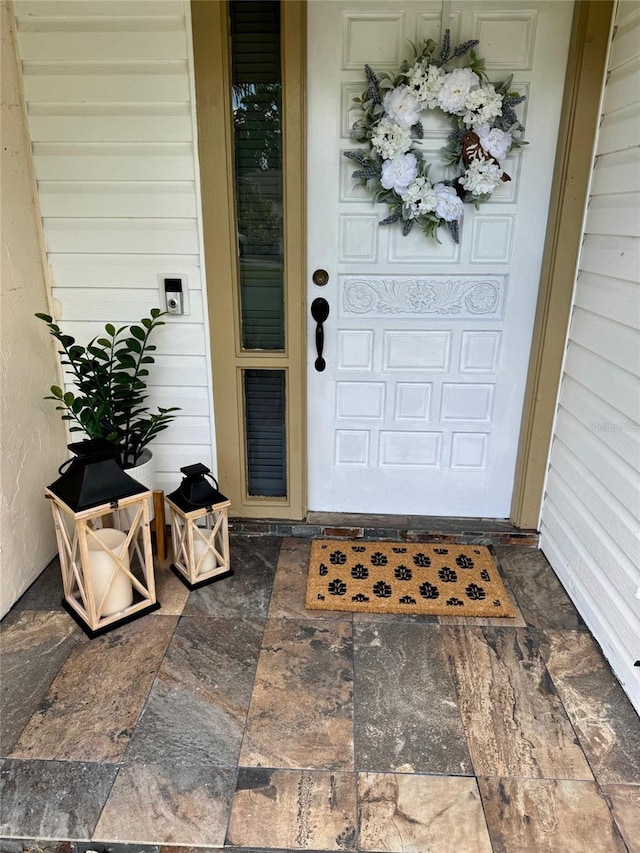 4966 Foxrun Ln, Lakeland, FL 33813 - view of exterior entry with covered porch