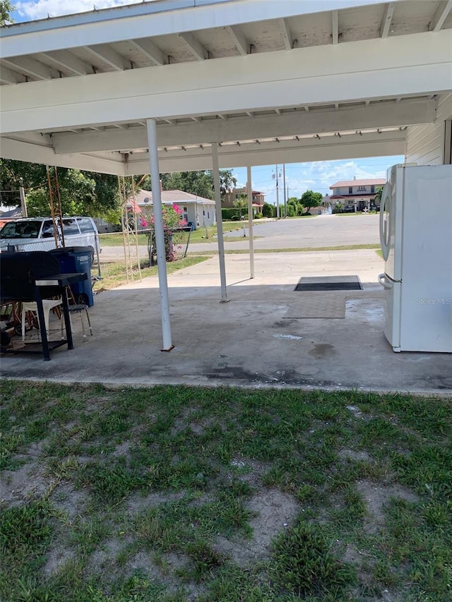 402 S Franklin St, Sebring, FL 33870 - view of patio / terrace with a carport
