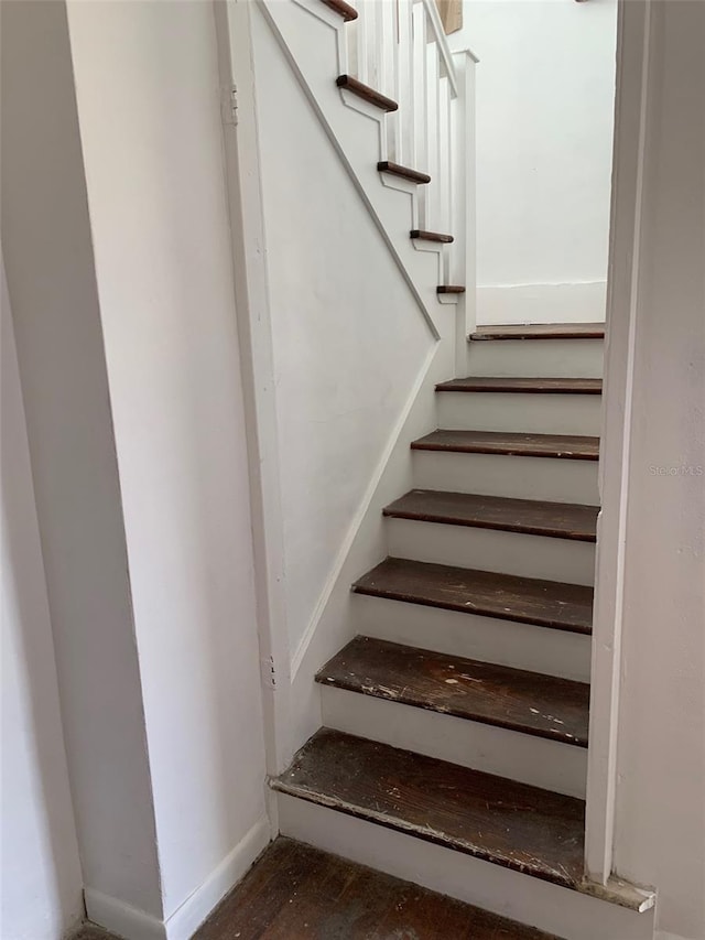 402 S Franklin St, Sebring, FL 33870 - stairs with wood finished floors and baseboards