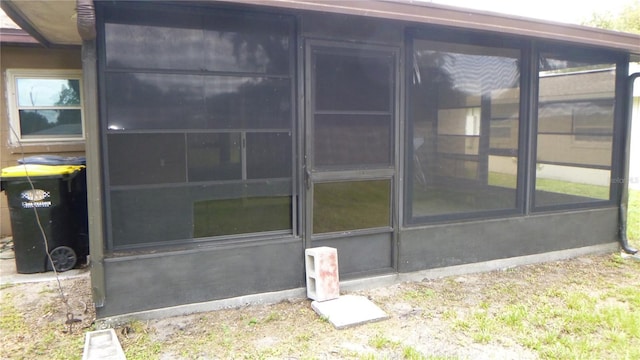 112 Bishop St, Auburndale, FL 33823 - view of home's exterior featuring a sunroom