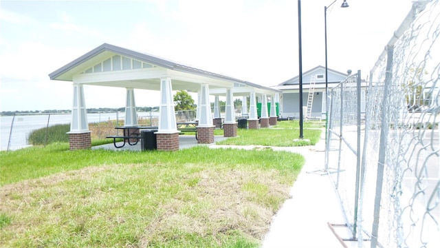 112 Bishop St, Auburndale, FL 33823 - view of property's community featuring a yard and a water view