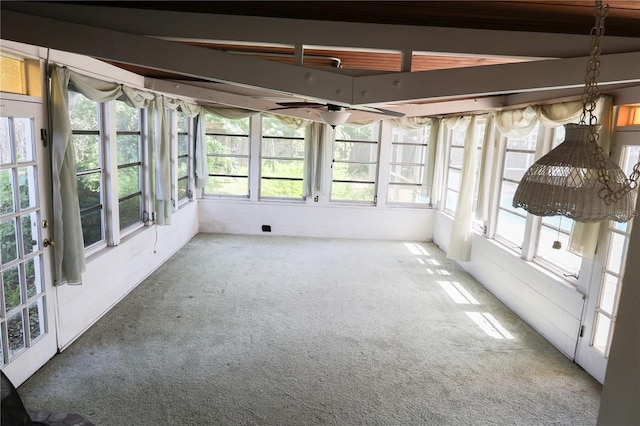 733 Oleander Dr SE, Winter Haven, FL 33880 - unfurnished sunroom featuring carpet floors, french doors, and healthy amount of natural light