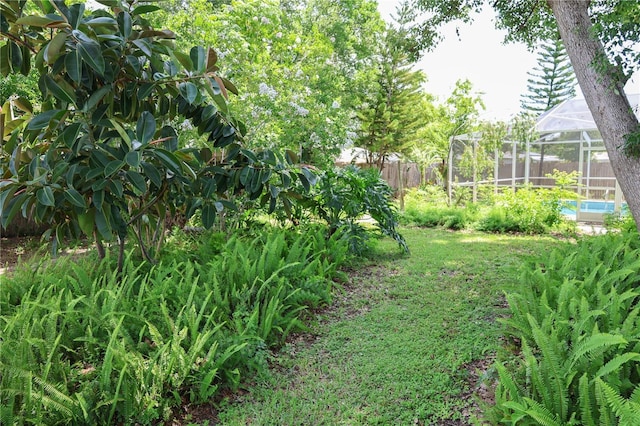 733 Oleander Dr SE, Winter Haven, FL 33880 - view of yard with a lanai