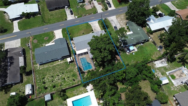 733 Oleander Dr SE, Winter Haven, FL 33880 - aerial view of residential area with a pool area and property boundaries highlighted