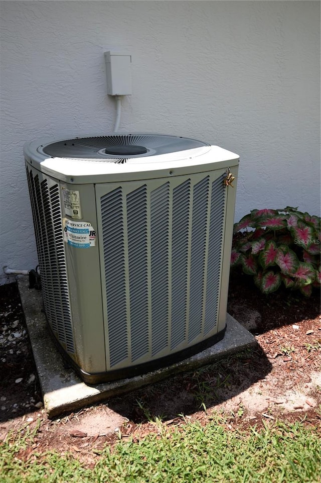 1922 N Torrington Rd N, Avon Park, FL 33825 - exterior view of a central air condition unit and stucco siding