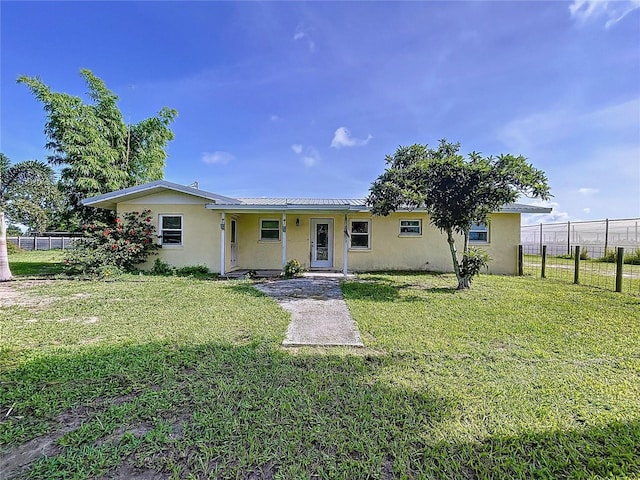1711 Estes Rd, Bartow, FL 33830 - view of front of property with stucco siding and a metal roof