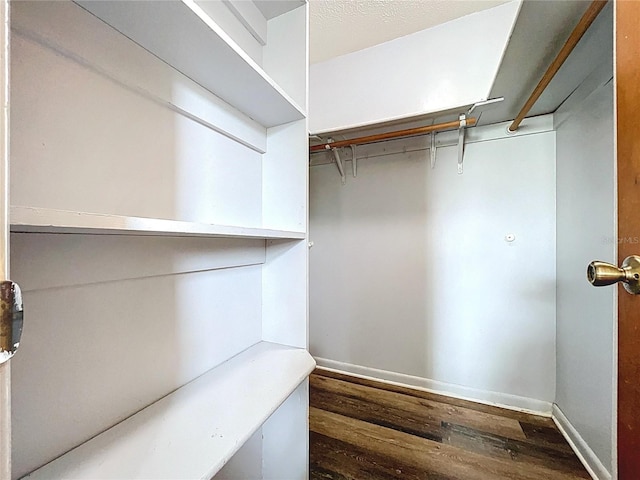 1711 Estes Rd, Bartow, FL 33830 - walk in closet with wood finished floors