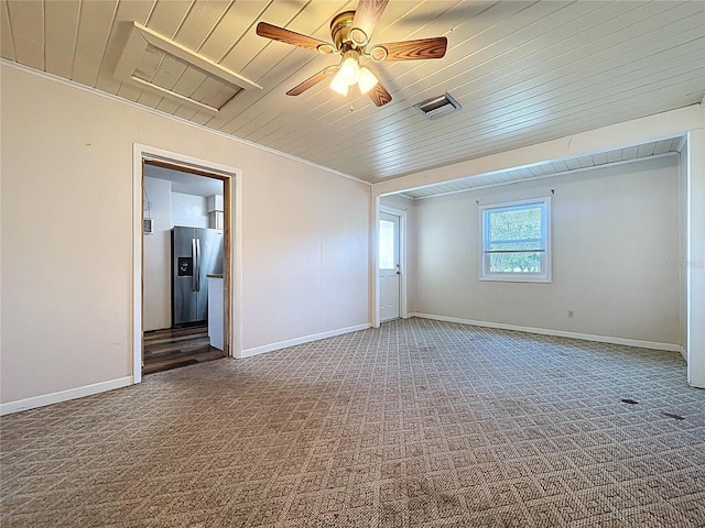1711 Estes Rd, Bartow, FL 33830 - carpeted empty room featuring wood ceiling, a ceiling fan, and ornamental molding