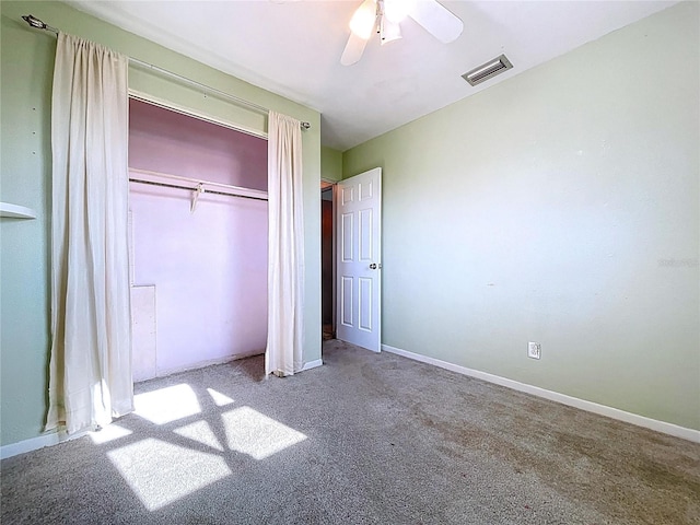 1711 Estes Rd, Bartow, FL 33830 - unfurnished bedroom with carpet floors, a closet, and a ceiling fan