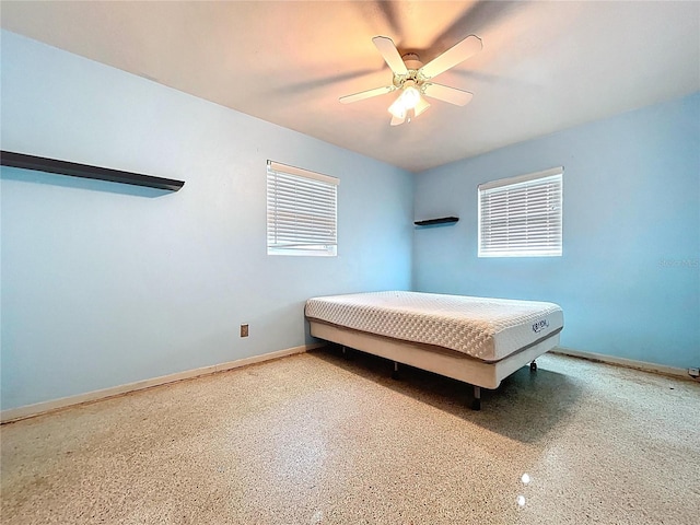 1711 Estes Rd, Bartow, FL 33830 - bedroom featuring speckle patterned floor and a ceiling fan