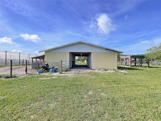 1711 Estes Rd, Bartow, FL 33830 - rear view of house with stucco siding