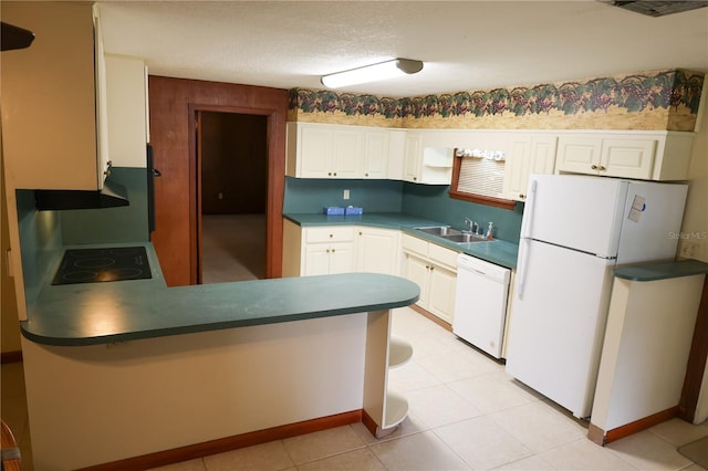 111 Deen Blvd, Auburndale, FL 33823 - kitchen with a peninsula, white appliances, white cabinets, and ventilation hood
